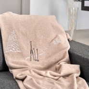 Taupe blanket with ski trace