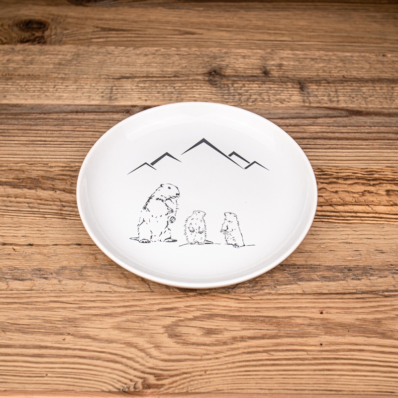 Mountain dessert plate with a pattern of three marmots.