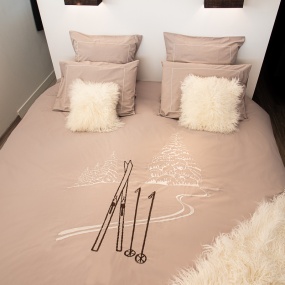 Taupe pillowcase with a white border matching the Taupe Ski Track duvet cover.