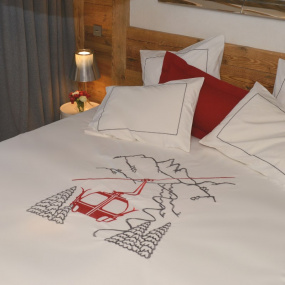 White duvet cover with red...