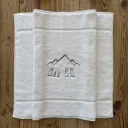 Tappetino da bagno stile montagna con ricamo tre marmotte.