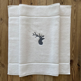 White Bath Mat with a deer