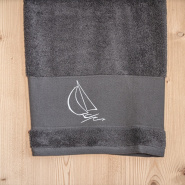 Grey shower towel with a sailboat 28 x 55 in