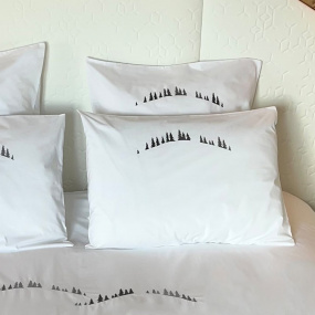 White rectangular pillowcase with fir trees 20 x 28 in