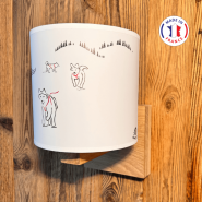Applique stile montagna in legno con un motivo a cani da slitta.