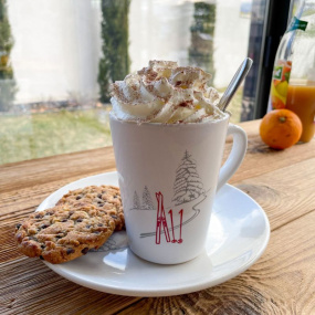 Hot chocolate served in a ski mug