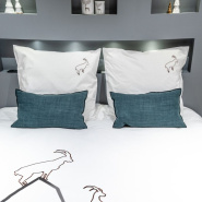 Square ibex pillowcase placed on the white ibex duvet cover.