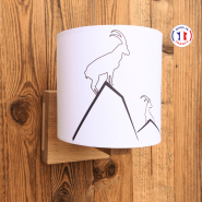 Applique in legno stile montagna con motivo a stambecco.