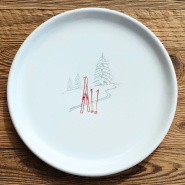 Mountain serving platter with a ski tracks pattern.