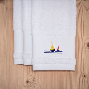 White guest towel with...