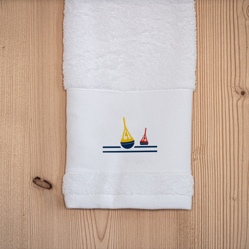 Asciugamano da bagno mare bianco ricamato con un motivo a boa da segnalazione.