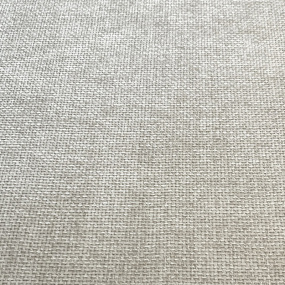 Close-up of the beige textured fabric of the mountain curtain.