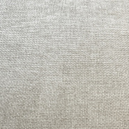 Close-up of the beige textured fabric of the mountain curtain.