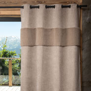 Beige mountain curtain with a faux fur band for a cozy chalet decor.